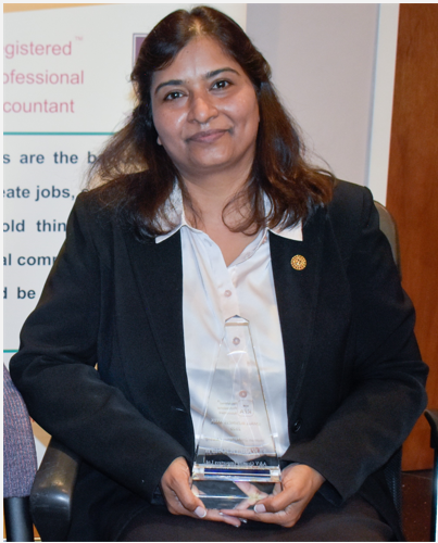 Elizabeth Joseph receiving award