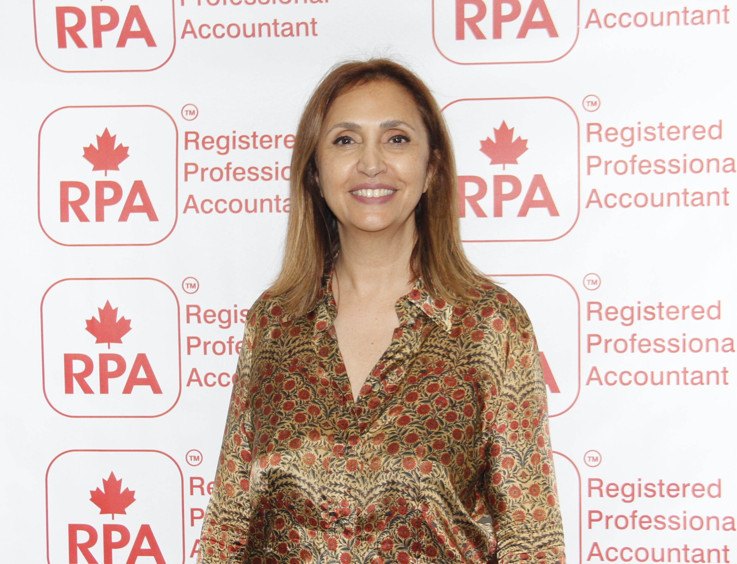 Mahnaz Atkinson receiving award