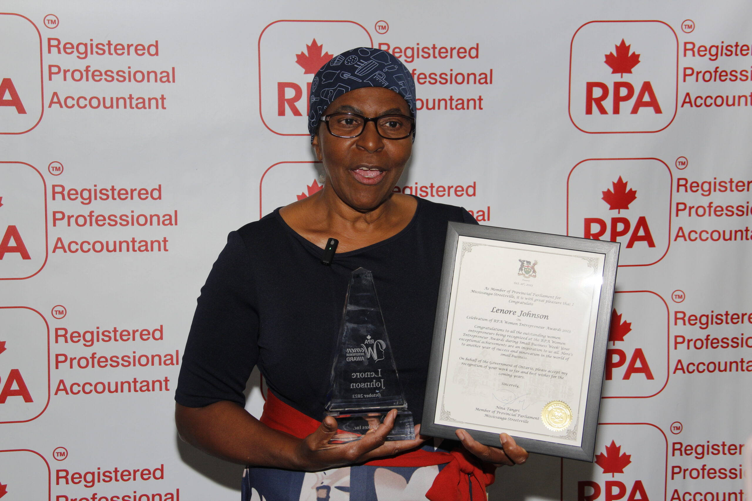 Lenore Johnson receiving award