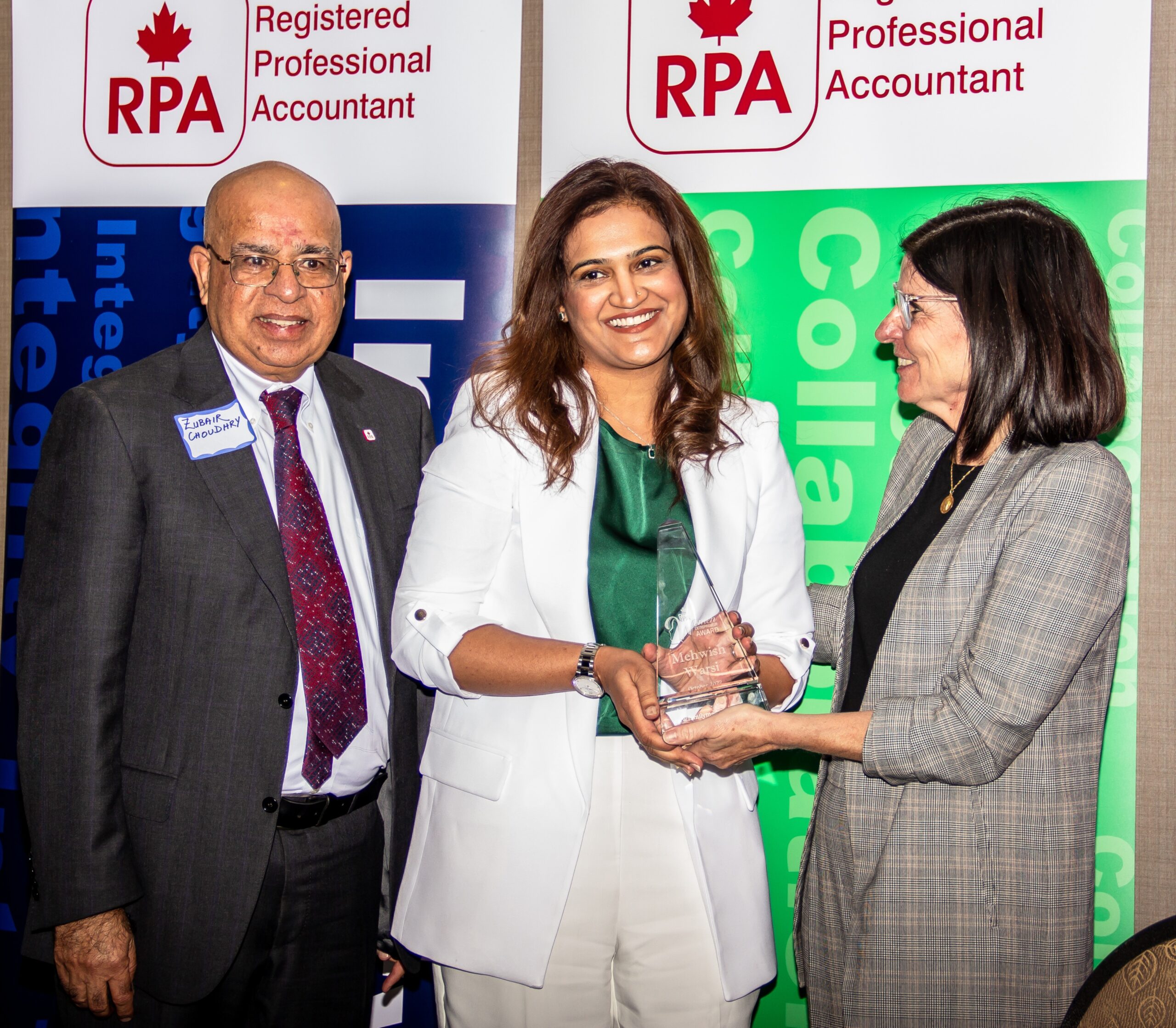 Dr. Mehwish Warsi receiving award
