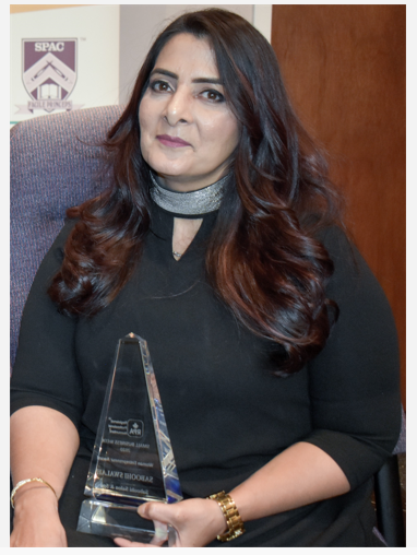 Saboohi Swalah receiving award