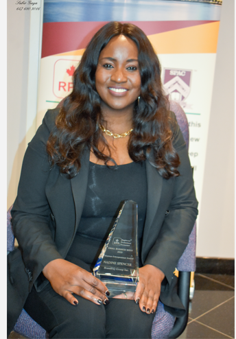 Nadine Spencer receiving award