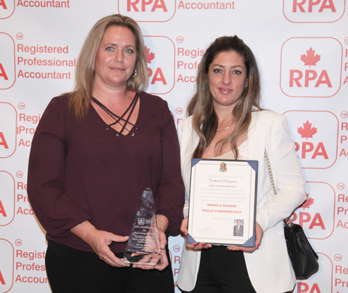 Daniela Rusque and Paula Vanbarneveld receiving award
